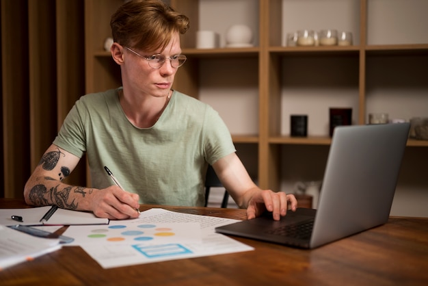 Young man learning in a virtual classroom