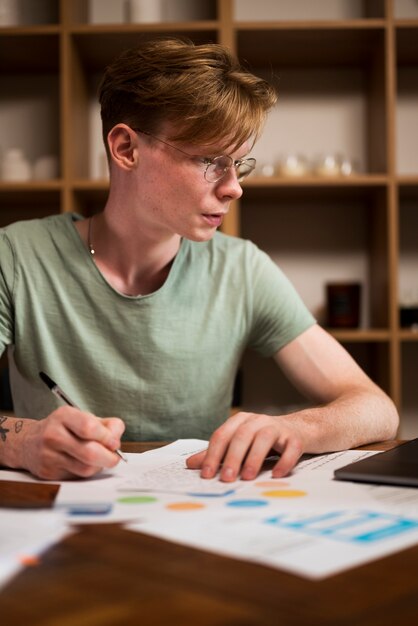 Young man learning in a virtual classroom