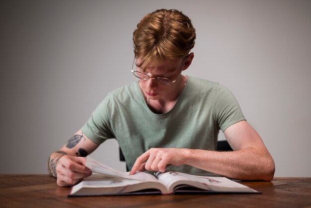 Young man learning in a virtual classroom