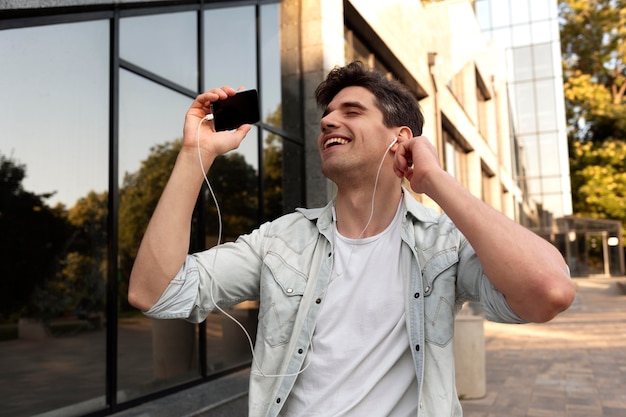 Young man listening to music