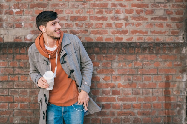 Young man listening to music.