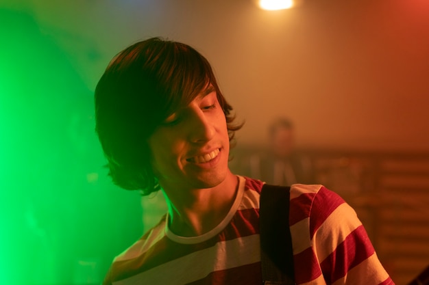 Young man during a live concert at a local event