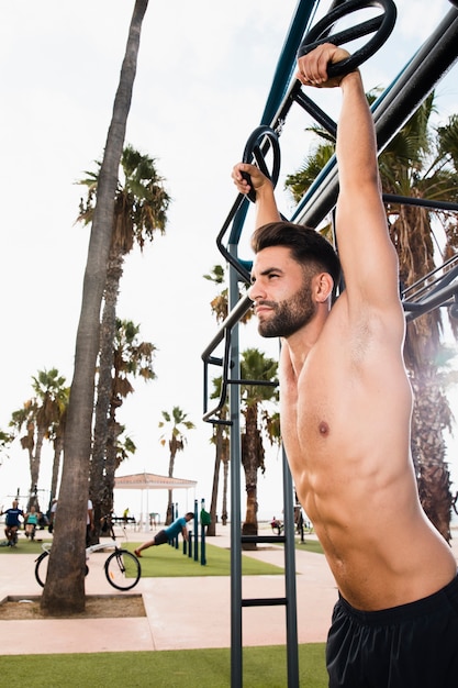 Free photo young man looking away while training