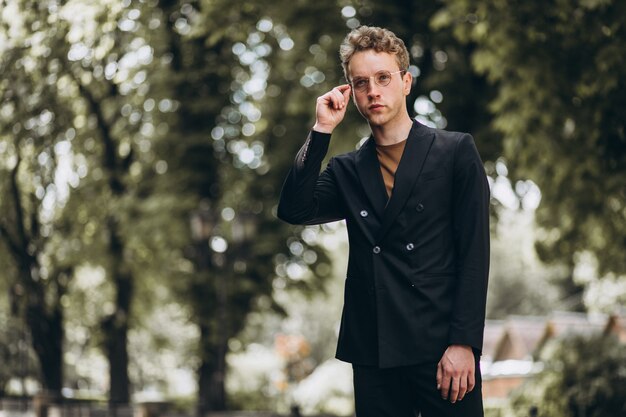 Young man model posing in the street