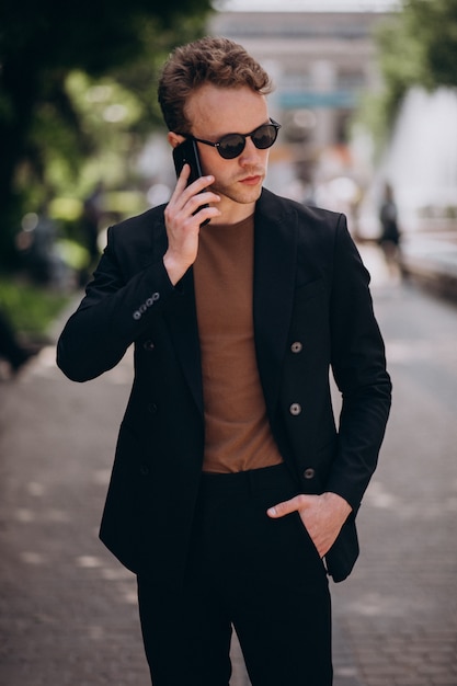 Young man model using phone