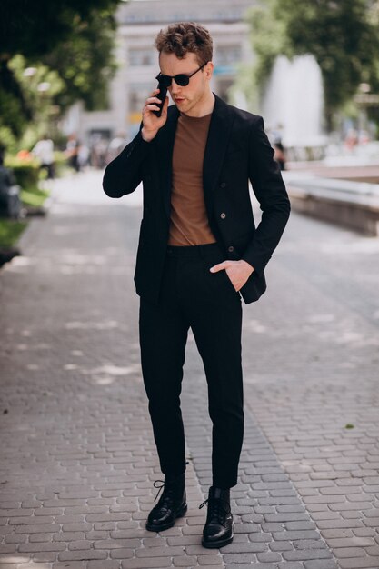 Young man model using phone