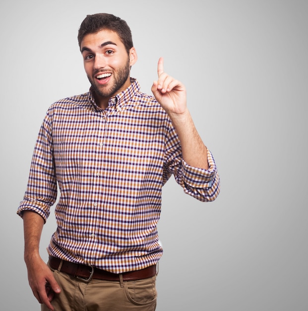 Young man in plaid shirt. 