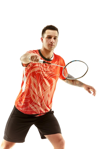 Young man playing badminton  .badminton player in action, motion, movement. attack and defense