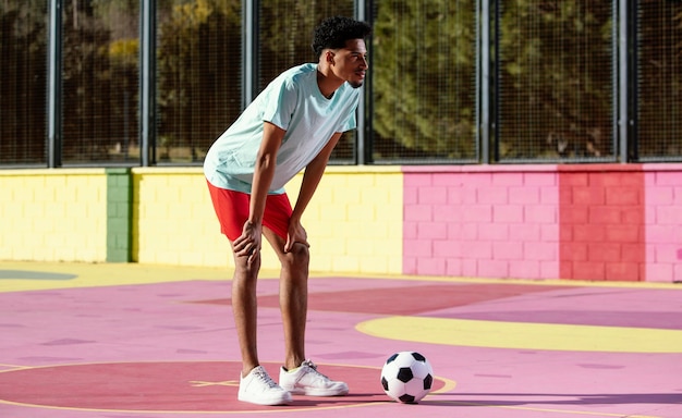 Young man playing football