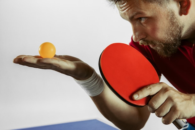 Young man playing table tennis