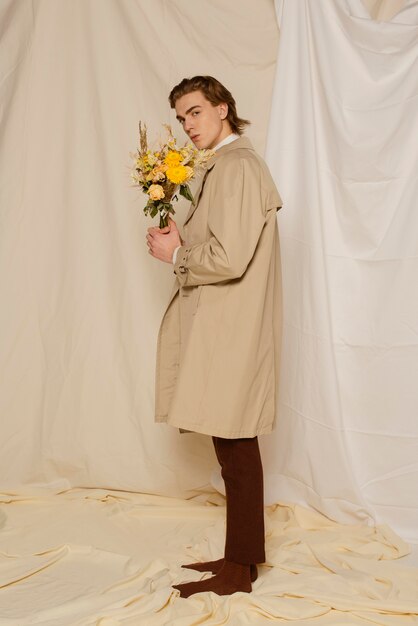 Young man portrait with flowers