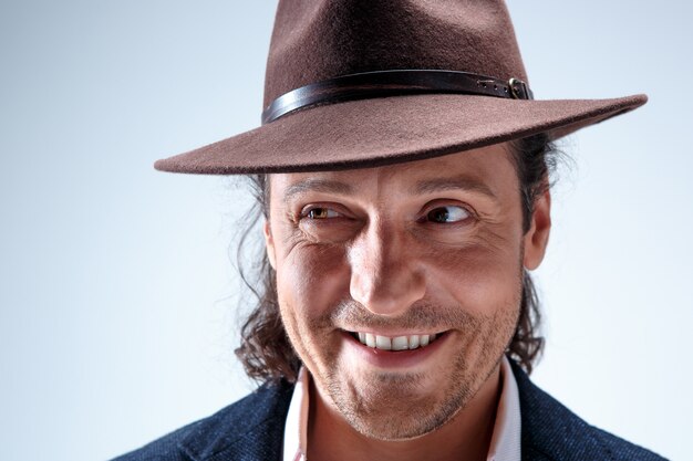 Young man portrait with hat .