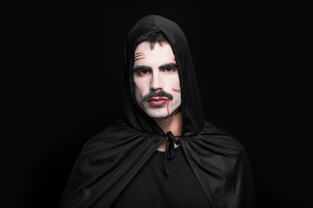 Young man posing in Halloween costume