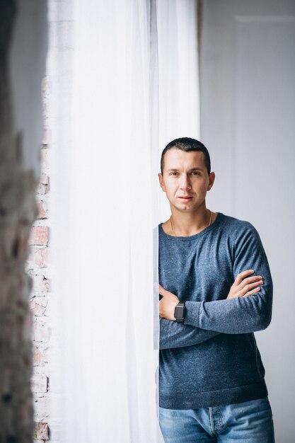 Young man posing in studio