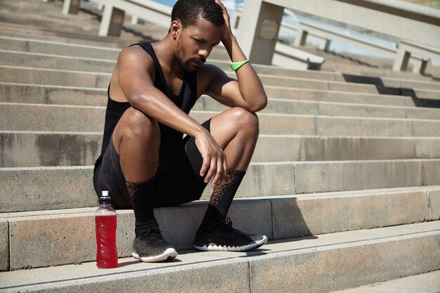 Young man resting after exercising