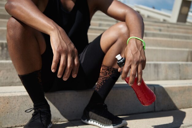 Young man resting after exercising