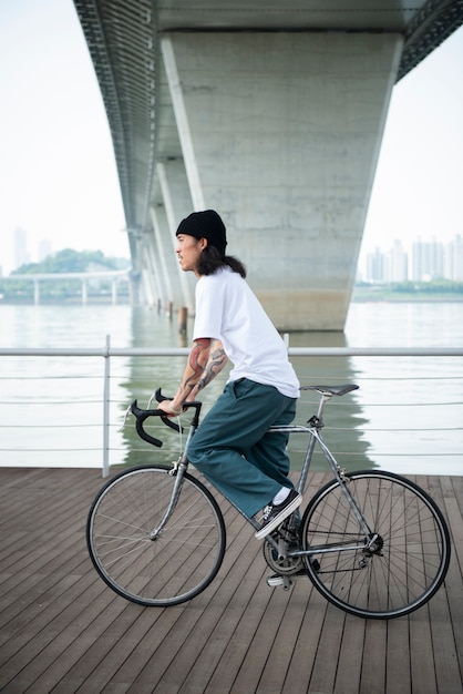 Young man riding his bike