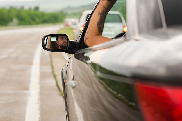 Young man on a road trip