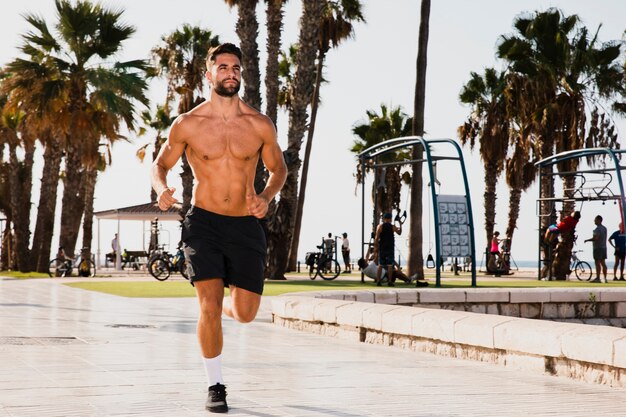 Young man running practice outside