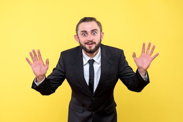 Young man satisfied with results on yellow