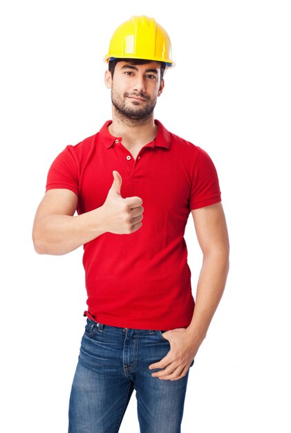 Young man showing thumb up on white background