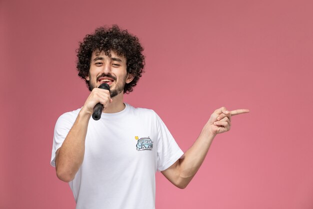 young man singing nice song to his friend