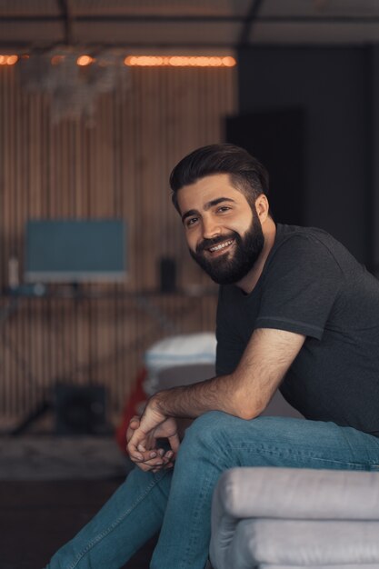 Young man sitting relaxing on the couch