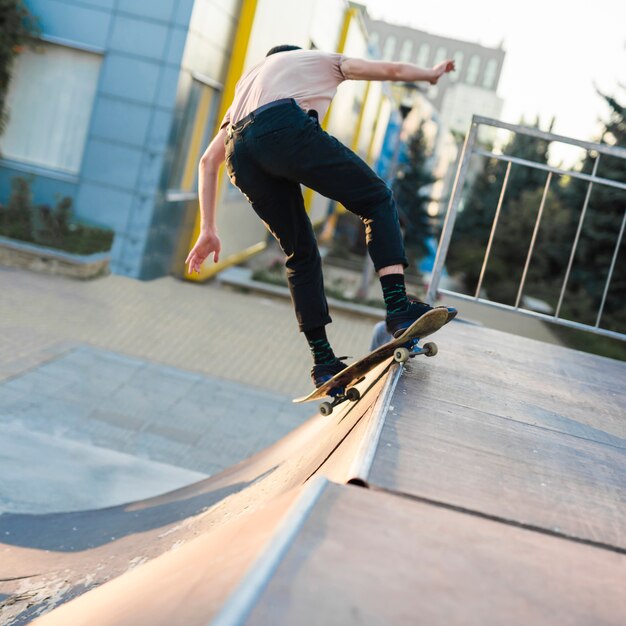 Young man skateboarding in the street