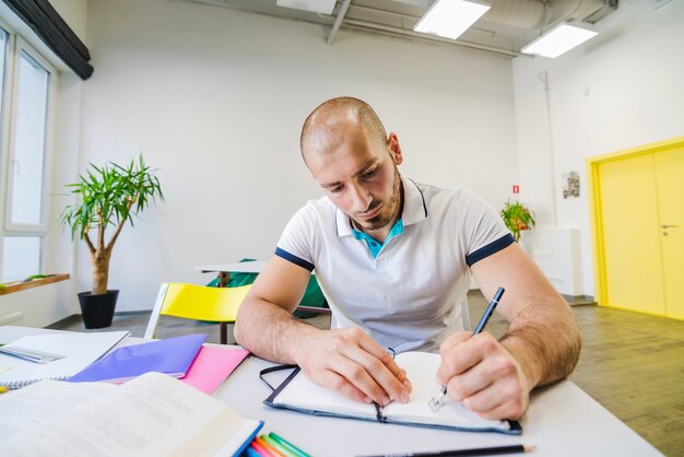 Young man studying alone