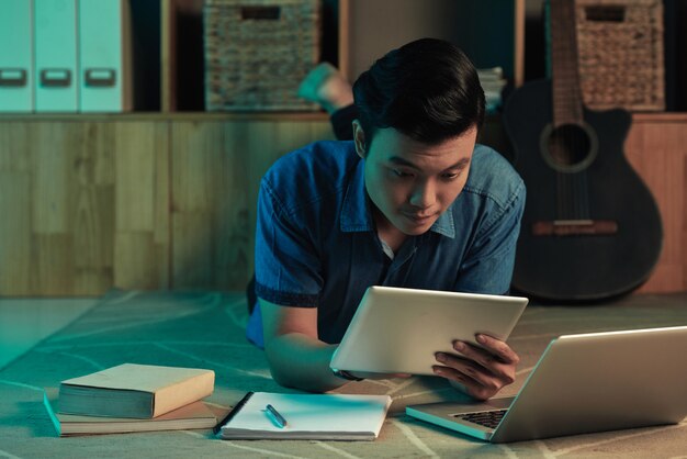 Young man studying for tomorrow class