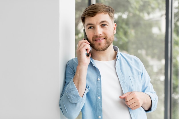 Young man talking on phone