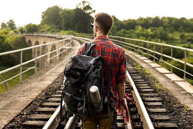 Young man on trail rail