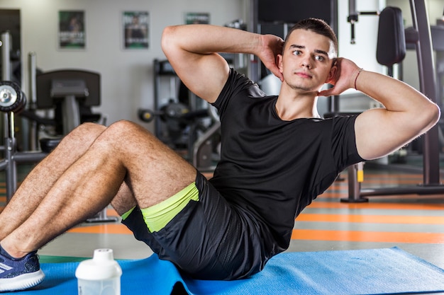 Young man training in the gym