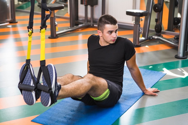 Young man training in the gym