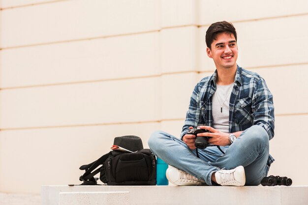 Young man traveling around the world