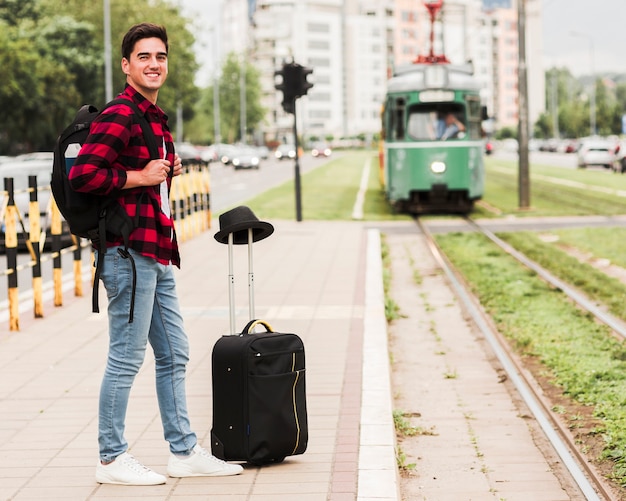 Young man traveling around the world