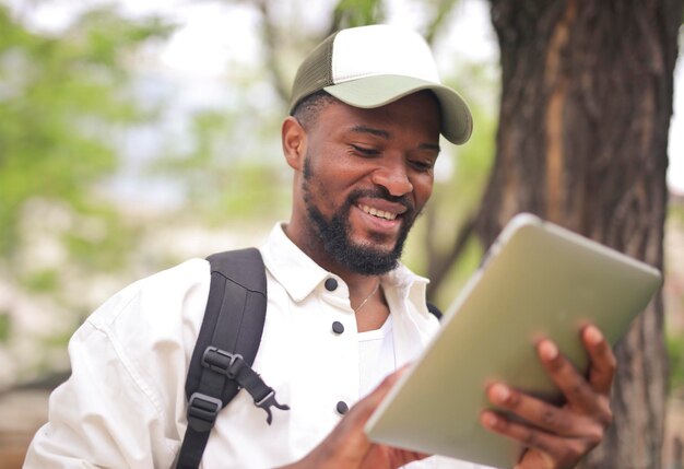 young man uses a tablet