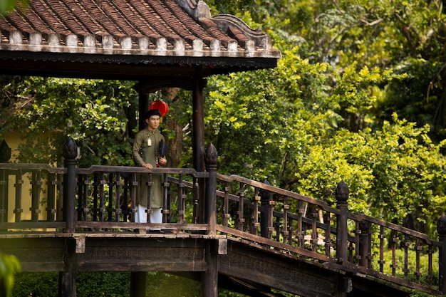 Young man wearing ao dai costume