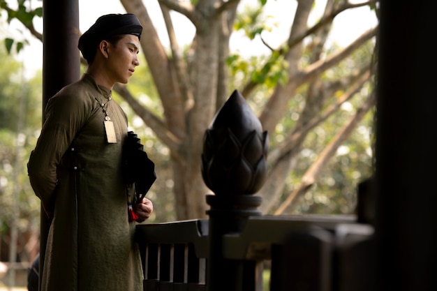 Young man wearing ao dai costume