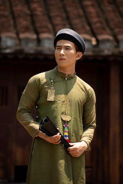 Young man wearing ao dai costume