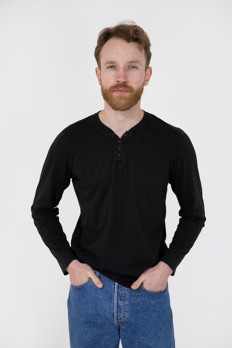 Free Photo young man wearing black shirt medium shot