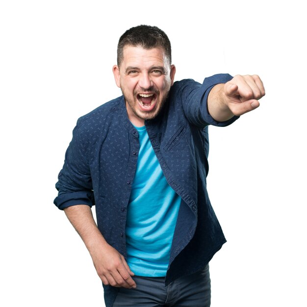 Young man wearing a blue outfit. Looking crazy.