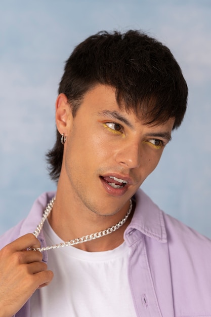 Young man wearing chain necklace