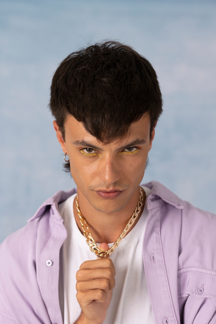Free Photo young man wearing chain necklace