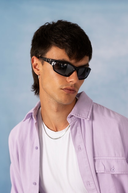 Free photo young man wearing chain necklace