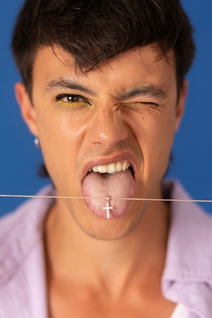 Young man wearing chain necklace