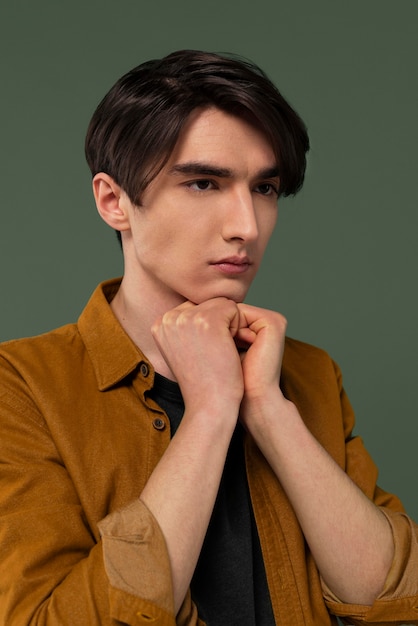 Young man wearing shirt posing