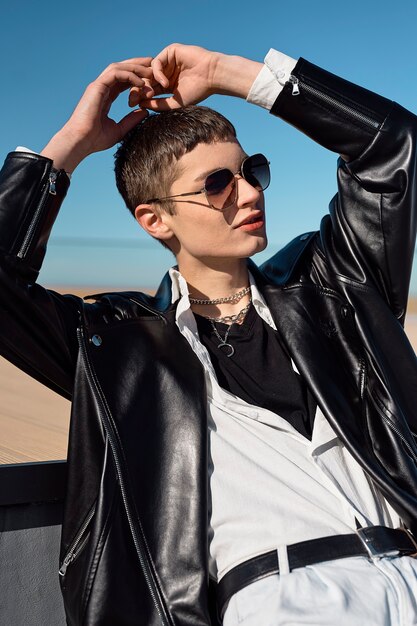 Young man wearing sunglasses medium shot