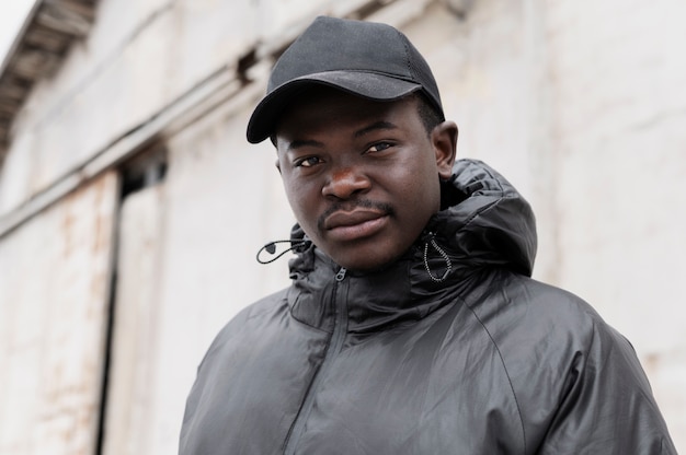 Young man wearing trucker hat