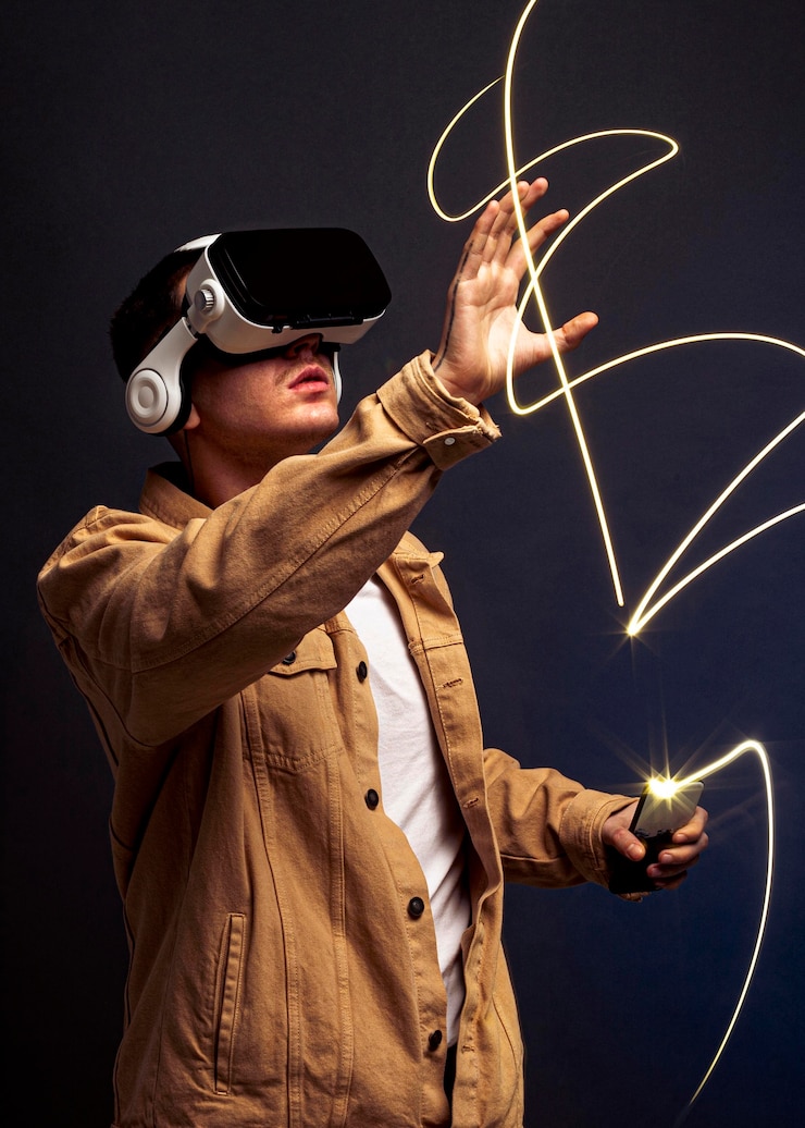 Free Photo young man wearing virtual reality goggles